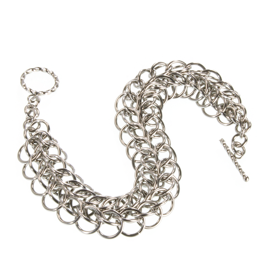 A steel persian chainmaille bracelet.