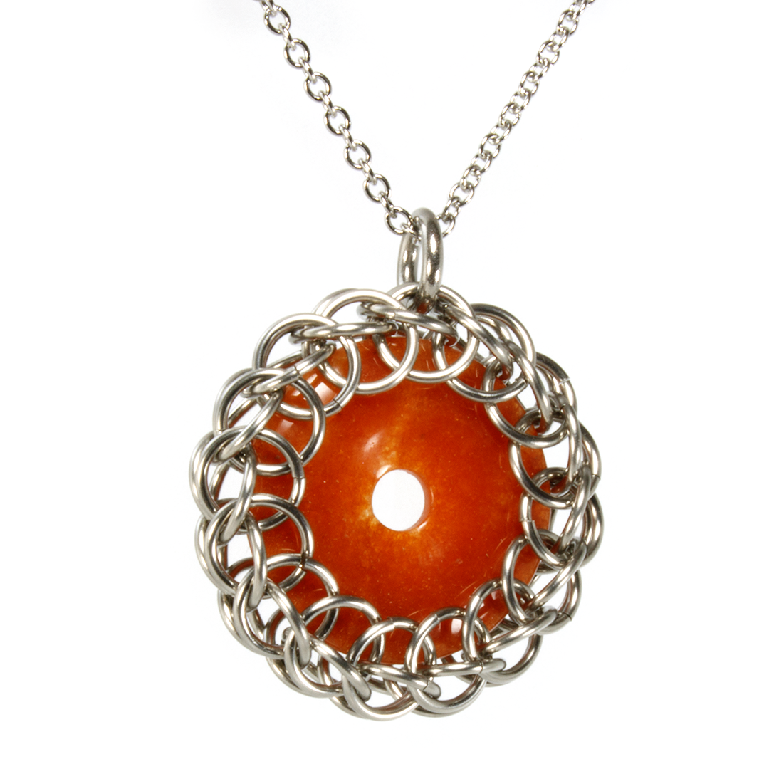 A steel and semi-precious stone persian chainmaille pendant.