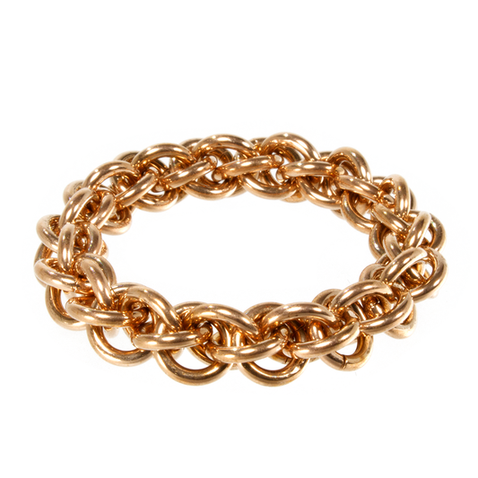 A bronze jens pind linkage chainmaille ring.
